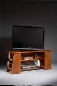 I decided to come up with a plan for an entertainment center that would fit perfectly into our little niche. Contemporary Tv Stand Popular Woodworking Magazine