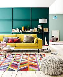 Green Wall Yellow Sofa And Bright Colored Carpet Living Room Color Schemes Living Room Color Yellow Decor Living Room