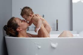 After your baby's umbilical cord stump falls off, you can transition from sponge baths to actual baths in a sink or a baby bathtub. 4 Tips For Bathing With Your Baby Parents