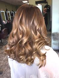 You can focus the layers around the front area to frame. Honey Brown Hair Trend Min Ecemella