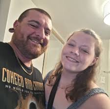 Tattooing One's Own Face: A Dragonfly Design