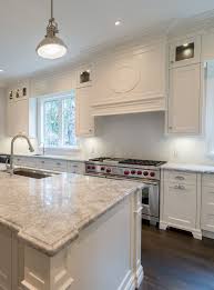 Even though soapstone costs an average of $20 more per square foot than standard engineered quartz, it's the ideal choice for a kitchen with white cabinets. White Kitchen Ideas Super White Granite Cc40 Cabinetry Decorative Hood Wolf Range Pras Super White Granite Kitchen Cabinets Decor Cream Kitchen Cabinets