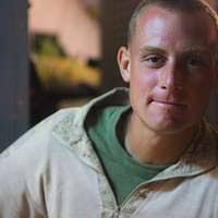 Marine Lt. Col. Lee Hemming speaks during a change