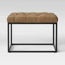 Take this one for example: Trubeck Tufted Metal Base Ottoman Faux Leather Brown Project 62 Target