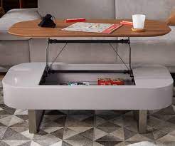 Enjoy incredible storage and an attractive piece of furniture with the magnussen stratton rustic lift top storage coffee table with casters, boasting a lift top for hidden storage. Baptisia Lift Top Storage Coffee Table Scandinavian Designs