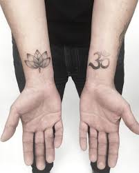 Amazing and beautiful om tattoo. Lotus And Om Tattoos By Gianina Caputo Tattoogrid Net