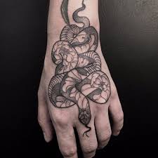 The gorgeous neotraditional skull and snake tattoo fits in on the lady's thigh. Women S Snake And Flower Tattoo Novocom Top