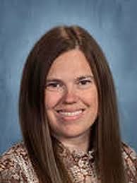 Caseville's Ona Warchuck helps guide students