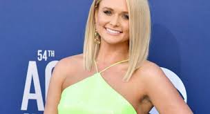 The settling down singer, 37, showed off her curves on sunday night's grammys 2021 red carpet, clad in a silver gown by lambert performed her hit song bluebird and accepted the award for best country album for wildcard during the ceremony. Miranda Lambert Net Worth 2021 Biography Income Songs