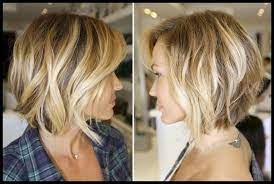 Gestufter Bob Mit Locken Strahnchen Und Schragem Pony Frisuren In Frisuren Tutorials Bob Frisur Haar Styling Kurzhaarfrisuren