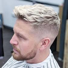 Textured top with zero fade and beard trim by Marc Book Ap…