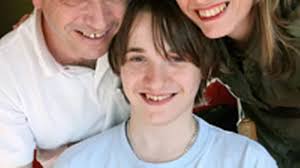 Mum and dad each donate a kidney to give their son life-saving transplant