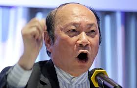 Hong Kong charges ex-legislator Chim Pui-chung, his son for fraud and a  businesswoman for money laundering