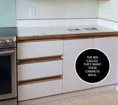 White Melamine Cabinets Melamine Cabinets Kitchen Cabinet Remodel Laminate Kitchen Cabinets