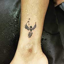 55 Cool Bird Tattoo Ideas That Are Truly In Vogue Music Notes Tattoo Tattoos Music Bird Tattoos