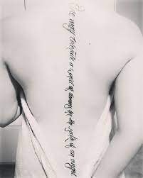 One May Tolerate A World Of Demons For The Sake Of An Angel Spine Tattoo I Just Got Dr Who Quote Tattoo Tattoo Quotes Tattoos Spine Tattoos