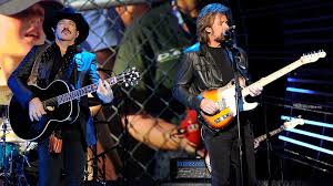 Certified platinum for sales of one million copies in the u.s., the album produced three top ten singles: Nascar Kix Brooks And Ronnie Dunn Remember Dale Earnhardt Door To Door