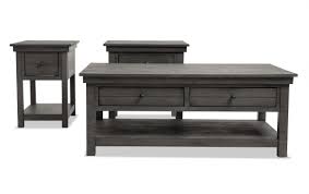 It makes the perfect perch for decorative serving trays or even board games for game nights with friends and family. Kona Coffee Table Set Bob S Discount Furniture