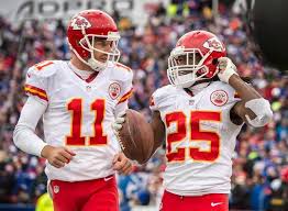 Alex smith, the quarterback for the kansas city chiefs, is having an incredible season, leading his team to their first nfl playoff victory in years! Kansas City Chiefs Quarterback Alex Smith 11 Congratulated Kansas City Chiefs Running Back Jamaal Charles Kansas City Chiefs Kansas City Nfl Chiefs Football