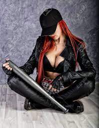 Stylish Hipster Woman With Big Tits In Baseball Cap And Black Jacket  Sitting On A Floor, Holding Baseball Bat. Stock Photo, Picture and Royalty  Free Image. Image 82651867.