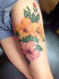 Dani Mawby Tattoo Hibiscus Flowers On Thigh In A Beautiful Realism Style Hibiscus Tattoo Hibiscus Flower Tattoos Flower Thigh Tattoos