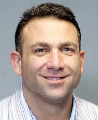 H.S. Wrestling: By bringing passion, Coach of the Year Battaglia leads  Spartans to historic season