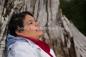 Body Positive Stock Photo: Young African American Woman in Garden