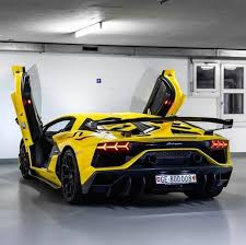 Lamborghini Aventador Svj Black And Blue Insane Shot Of This Yellow Lamborghini Aventador What Is Your Dreamcar Lamborghini Aventador Lamborghini Aventador Lamborghini Cars Sports Car Brands