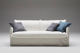 This sofa scarf/cover is so easy to pop off and pop back on for washing. Clarke Shabby Chic Sofa With Skirt