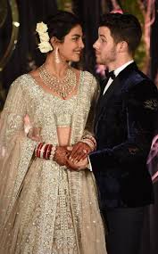 Inside Nick Jonas And Priyanka Chopra S Post Wedding Reception Priyanka Chopra Wedding Indian Bridal Outfits Indian Bridal Fashion