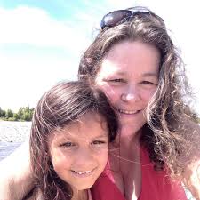 How do women with angina differentiate between angina and heartburn  symptoms?