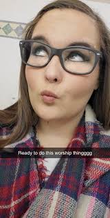 So I'm the one sitting down my husband standing anyway to take other lady  out of pic and put more musical instruments around us maybe remove sweater  in my lap and I