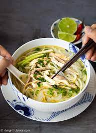 Authentic Pho Ga Vietnamese Chicken Noodle Soup Delightful Plate Recipe Chicken Noodle Pho Spices Spicy Asian Chicken