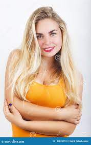 Smiling Pretty Young Blonde Girl with Perfect Skin and Big Breasts in  Orange Top Stock Image - Image of adult, cheerful: 107835713