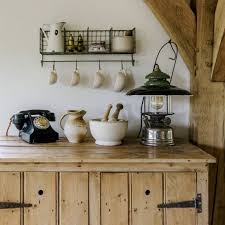 Since a country style kitchen usually combines the dining and kitchen area, there are more pieces of furniture to harmonize in color. Country Kitchen Pictures Ideal Home