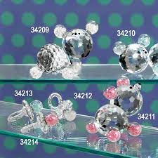 Il regalo più bello che si possa fare ai vostri parenti ed amici per il. Bomboniere Animaletti Con Fiore In Swarovski E Punto Luce Battesimo Comunioni