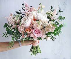 image may contain flower and plant floral wreath floral flowers