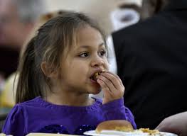 Giant family" gathers for Thanksgiving meal at First United Methodist Church