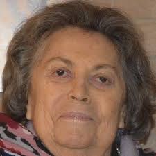 Ciao Nonna Clara! Qui sei con due dei tuoi cinque figli, Enrico e Giuppi, e  la prima dei tuoi nipoti, Maria. Era il 1957. Lì vicino c'erano anche le  tue figlie Liliana