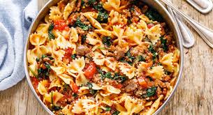 Combine lemon zest and juice from 1 lemon in a large bowl with the garlic, pepper, 3/4 tsp. Tomato Spinach Sausage Pasta Recipe How To Cook Sausage Pasta Eatwell101