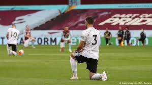 Players kneel against racism as Premier League returns | News | DW |  17.06.2020