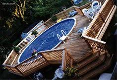 Pin By Emily Morris On Pool Deck Ideas Decks Around Pools Swimming Pools Backyard Swimming Pool Decks