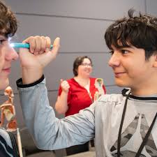 Nothing like a little hands-on learning for some of the Greeley-Evans  District 6 8th graders! That's what our annual Gut into the Guts of  Healthcare event is all about. This event allows