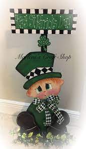 Patrick's day event with a rainbow balloon arch. St Patrick S Day Decoration Leprechaun Decoration Shamrock Decoration Handmade Leprechaun Porch Stand Irish Decoration Leprechaun Stand St Patricks Crafts St Patrick S Day Decorations Irish Decor