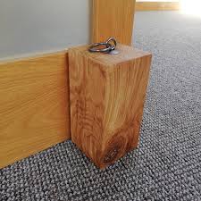 The rubber bumper tip protects the door from getting damaged. Oak Beam Door Stop With Iron Handle Celtic Timber