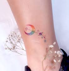 Rainbow watercolor jc type simple cloud tattoo for men. 51 Dreamy Moon Tattoos To Brighten Up Your Aura Our Mindful Life