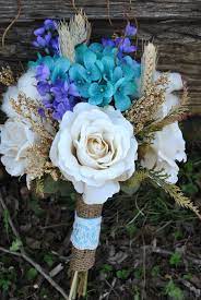 While our shop specializes in all kinds of roses, we also carry bridal bouquets made completely of other gorgeous flowers such as hydrangeas, calla lilies, and even sunflowers. Country Chic Silk Bouquet Cream Roses Teal Hydrangea Seeds Purple Stock Wheat And Greens Ste Blue Wedding Bouquet Burlap Bouquet Wedding Wedding Bouquets