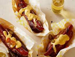 Hot dogs are nothing more than ground meat with seasonings and are easy to make at home when you follow this delicious recipe. Pretzel Buns With Grilled Dogs And Spicy Cheese Sauce Recipes Network