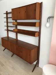 The mid century wall unit encompasses the egalitarian accessible and functional design principles that were so important to mid century designers in particular. Mid Century Teak 2 Bay Ergo Norwegian Free Standing Wall Unit Home Union Nyc