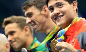 On their victory lap, schooling turned to phelps and said, dude this is crazy, out of this world, i don't know how to. Michael Phelps Taught A Lesson For Once By Singapore S Joseph Schooling Rio 2016 The Guardian